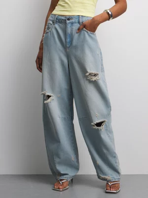 The FIX Women's Light Wash Rip & Repair Barrel Denim Jeans