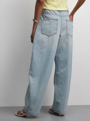 The FIX Women's Light Wash Rip & Repair Barrel Denim Jeans