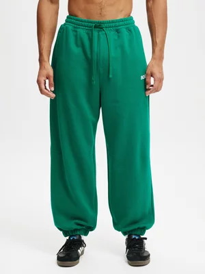 Men's Cotton On Green Super Baggy Cuffed Graphic Track Pants