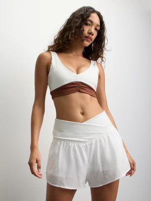 The FIX Women's  Milk Nylon Cross Front Tennis Shorts