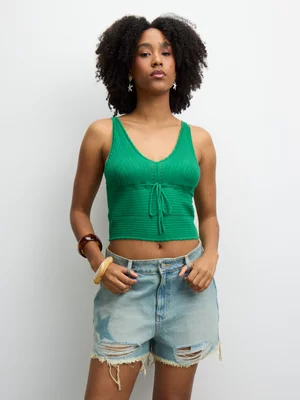 The FIX Women's Mid Wash Star Shorts With Rips